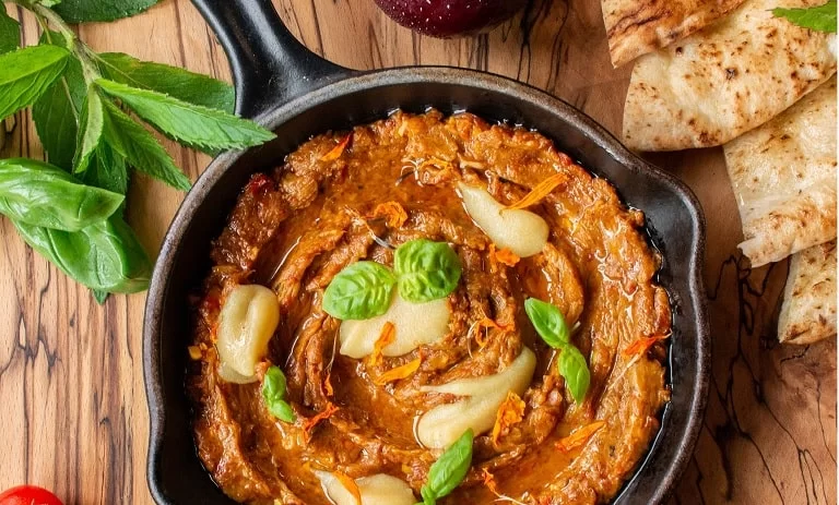 Mirza Ghasemi Recipe: Traditional Persian Eggplant Delight - step image